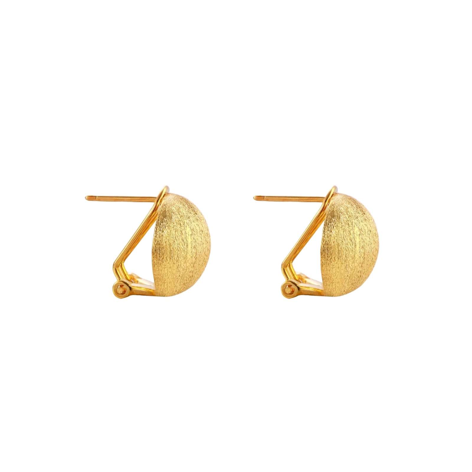 Pair of brushed gold dome earrings with clip backs showing textured matte finish on cream background