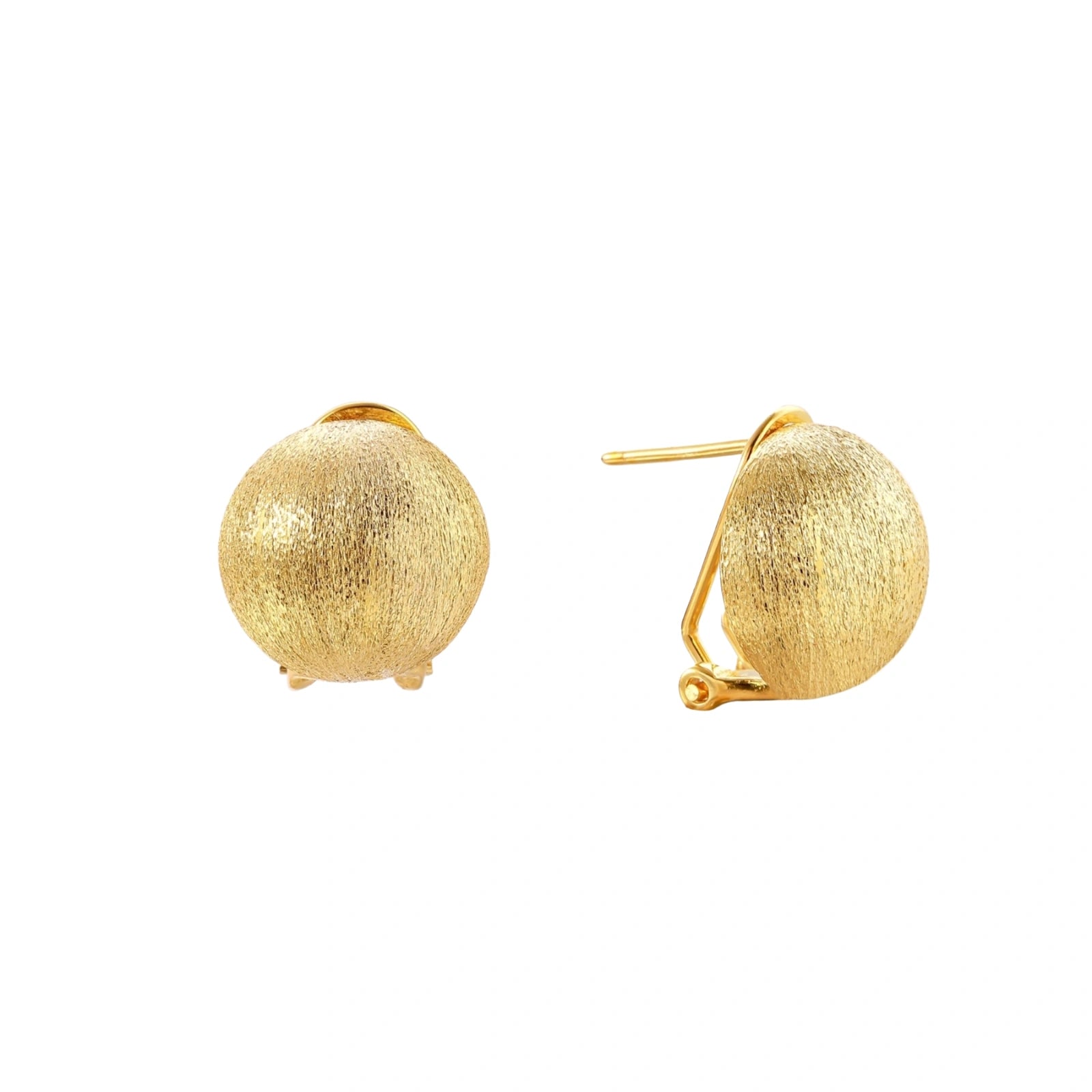 Pair of brushed gold dome earrings with clip backs showing textured matte finish on cream background