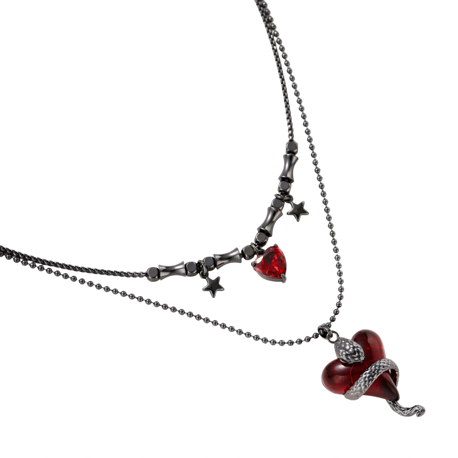 Gothic jewelry set with asymmetrical black metal earrings featuring red crescent moons, stars, and layered necklaces with heart pendants