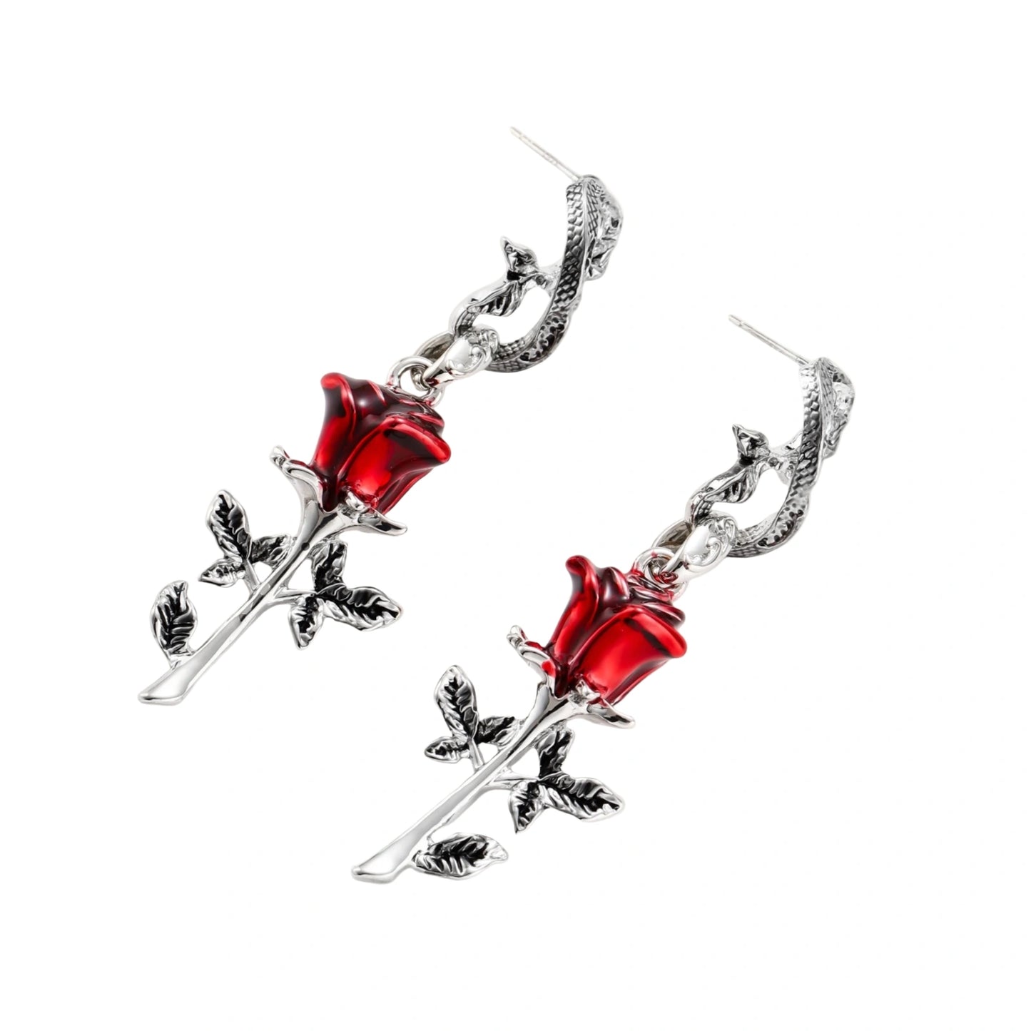 Gothic jewelry set with silver snake designs holding red enamel roses, featuring detailed leaf stems on cream background