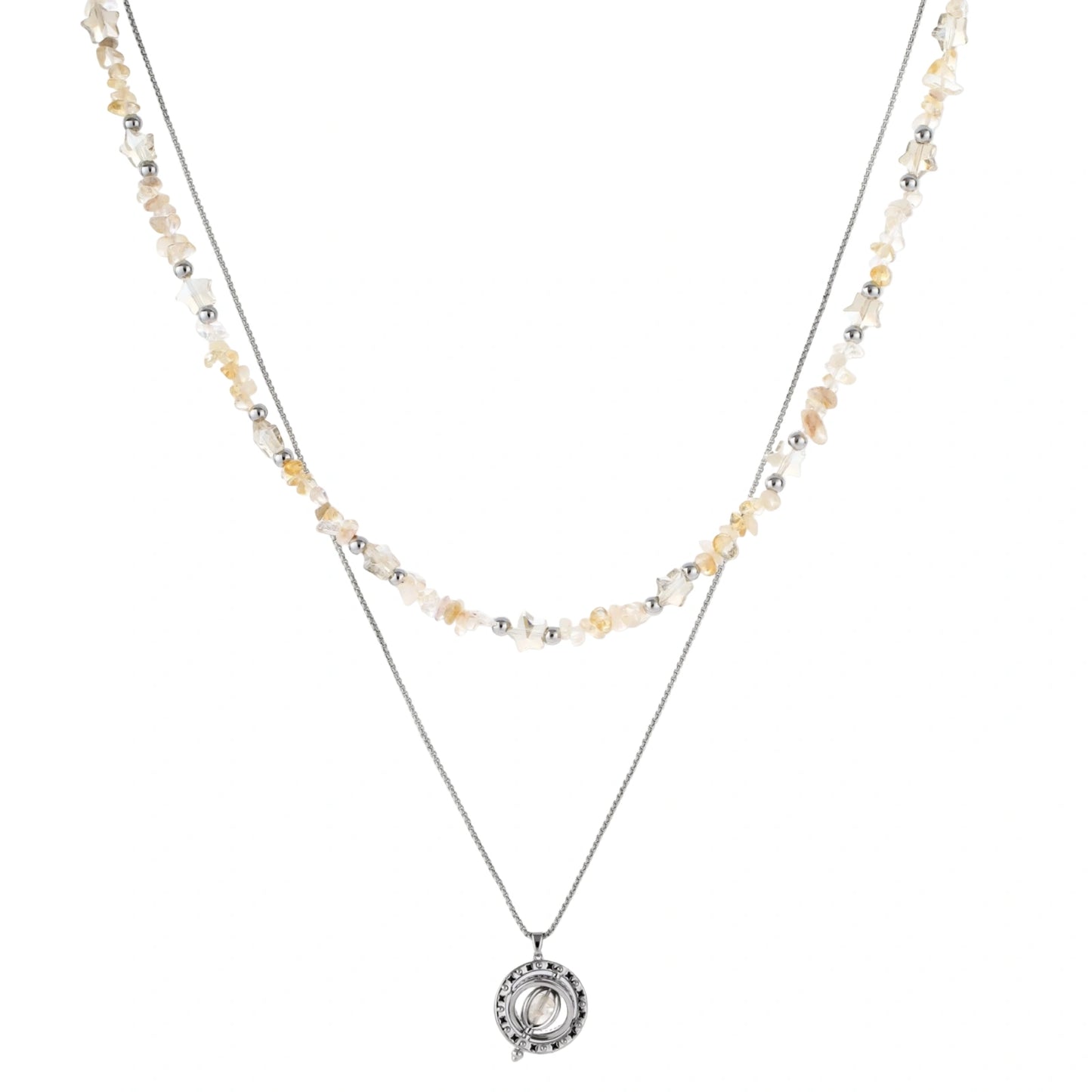 Complete jewelry set featuring citrine stone chips, silver beads, and cosmic circle pendants on cream background.