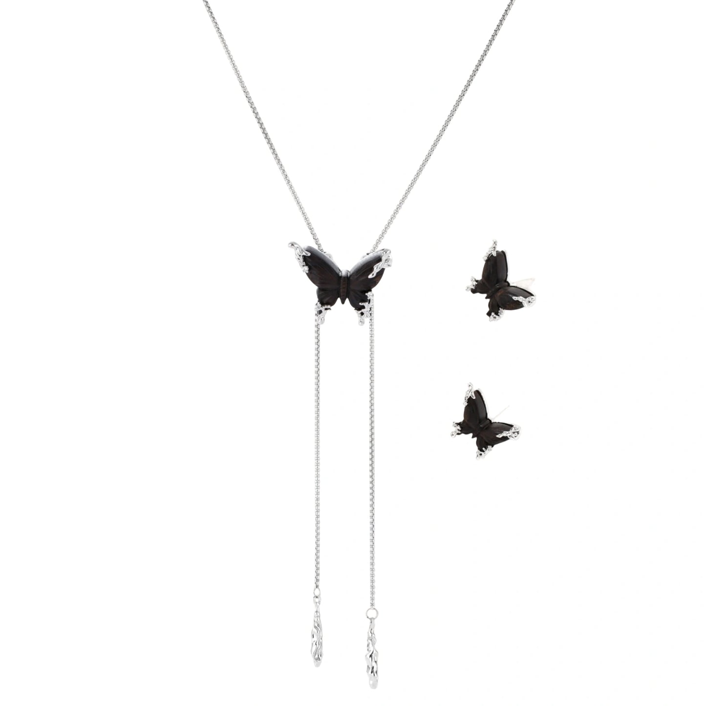 Dark wood butterfly earrings and necklace with silver chain accents on white background, showing natural grain texture.