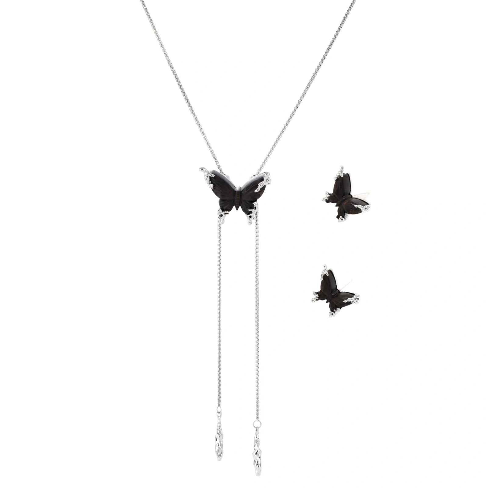 Dark wood butterfly earrings and necklace with silver chain accents on white background, showing natural grain texture.