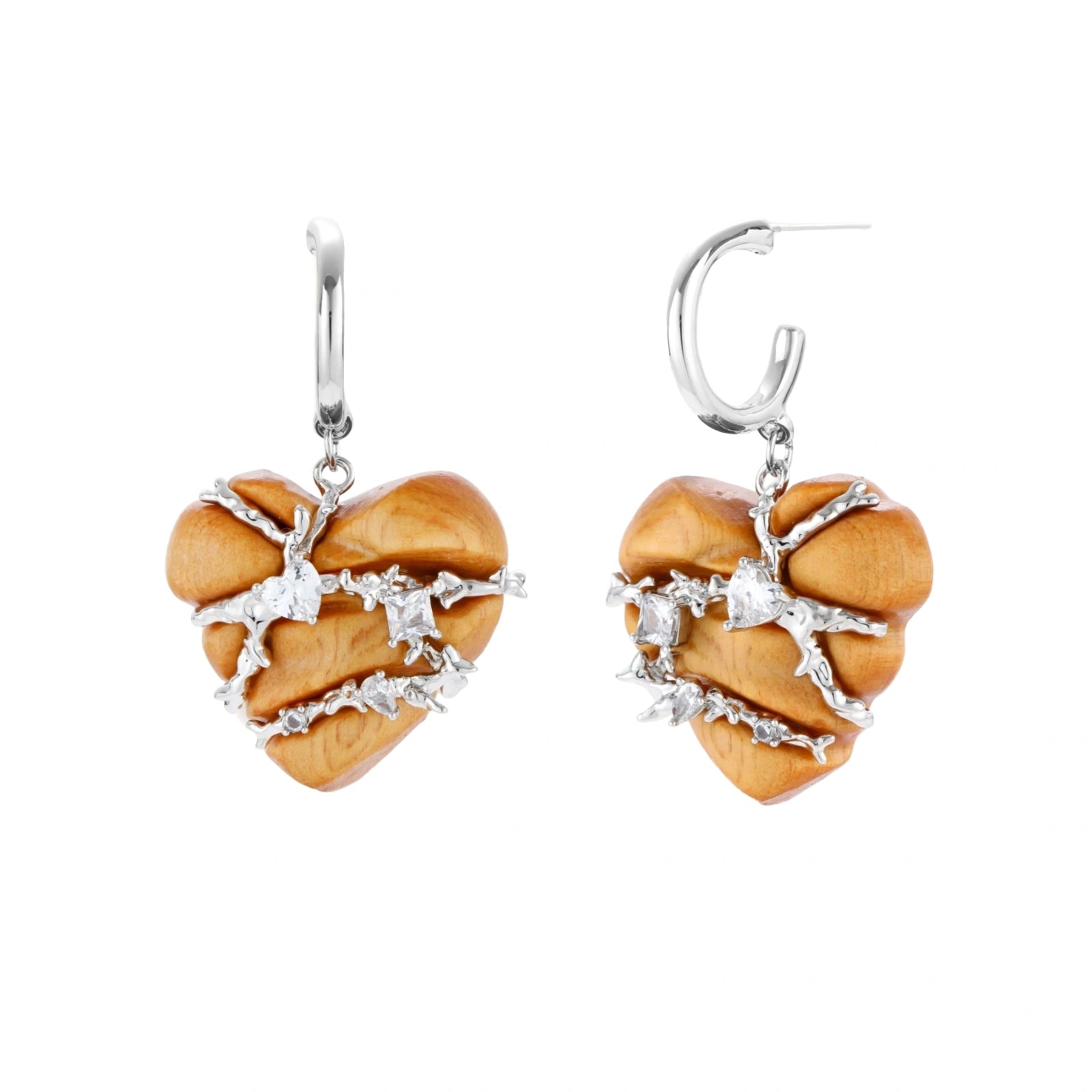 Heart-shaped eco-brass and wood jewelry set with silver wire detailing and crystal accents on cream background.