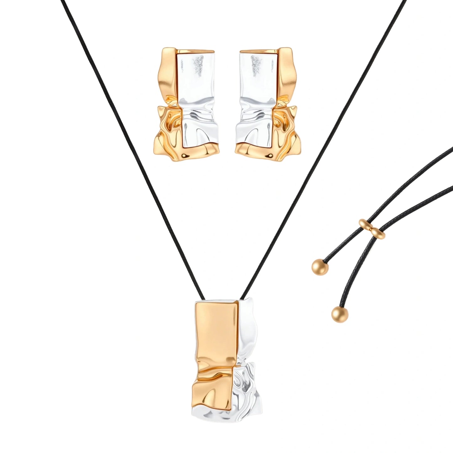 Modern jewelry set with abstract gold and silver pendant on black cord necklace plus matching geometric earrings on white background.