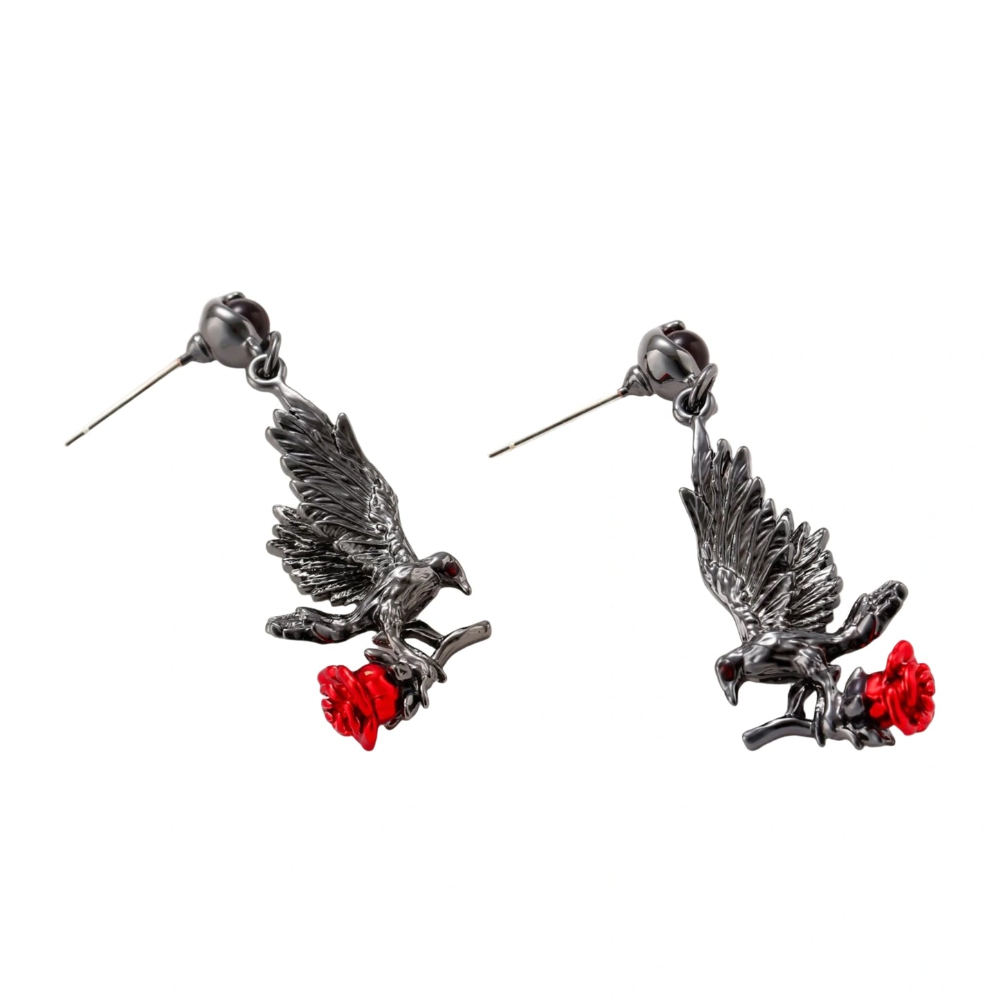 Dark gunmetal jewelry set featuring detailed raven pendants carrying red enamel roses with layered pearl and chain necklaces