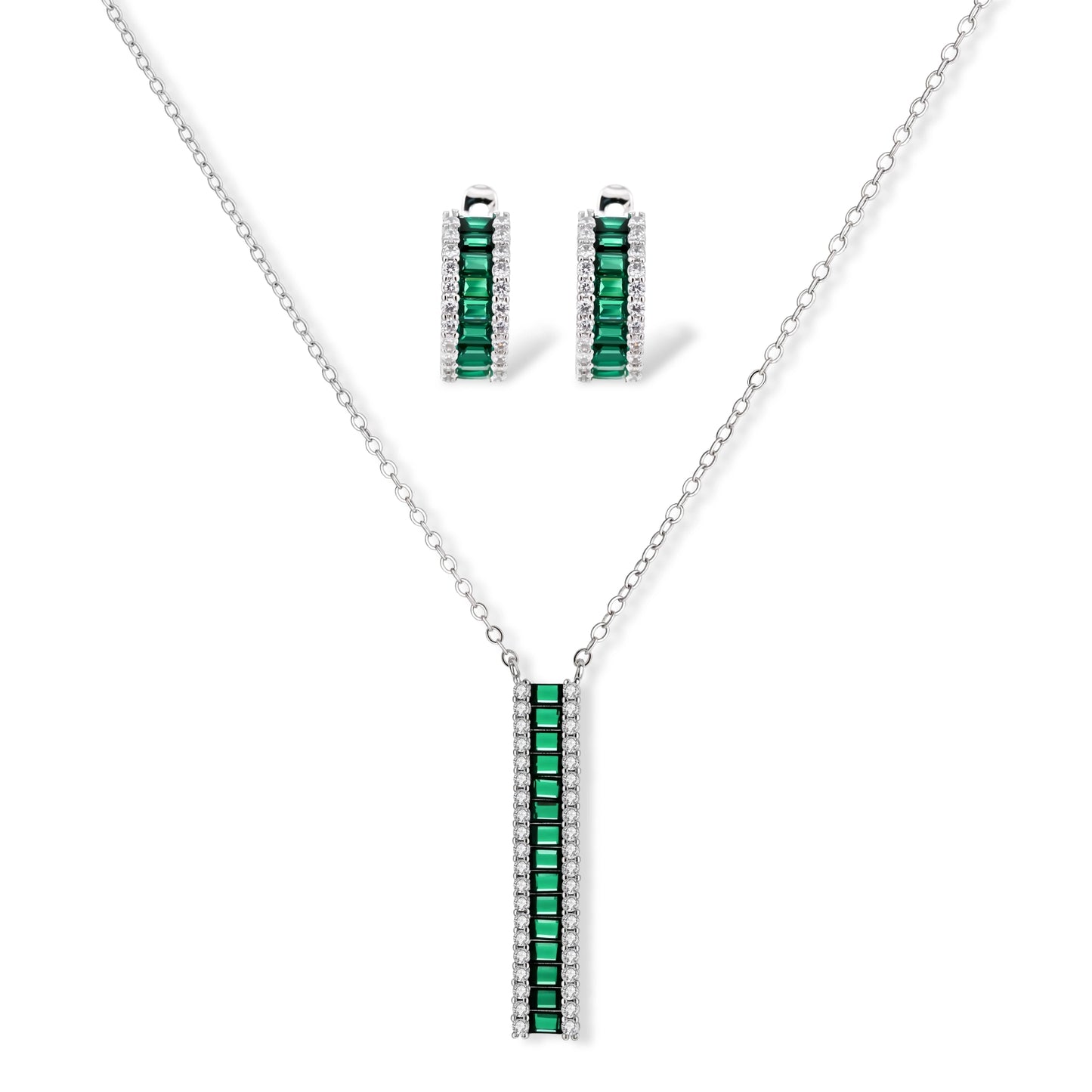 White gold plated jewelry set with emerald green rectangular stones and clear crystals in geometric rows on white background.
